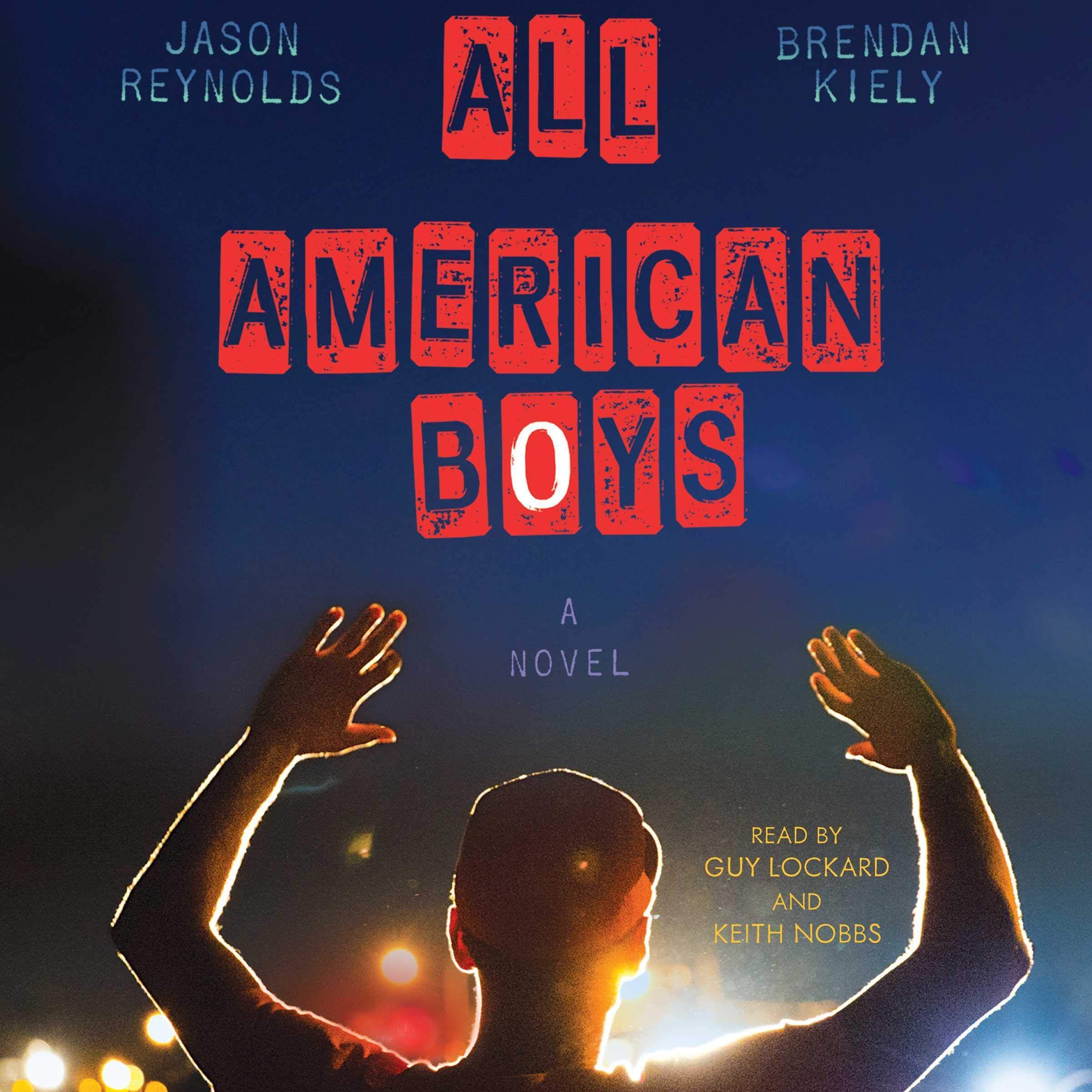 Jason Reynolds, Brendan Kieley All American Boys above a closeup picture of the back of a person with his hands raised above head.  The person appears to be standing facing headlights.