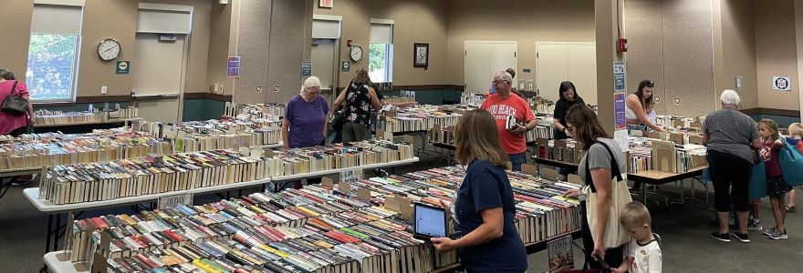 Customers browsing the thousands of books at our annual book sales