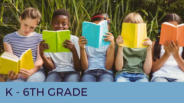 5 children sitting reading a book of different colors