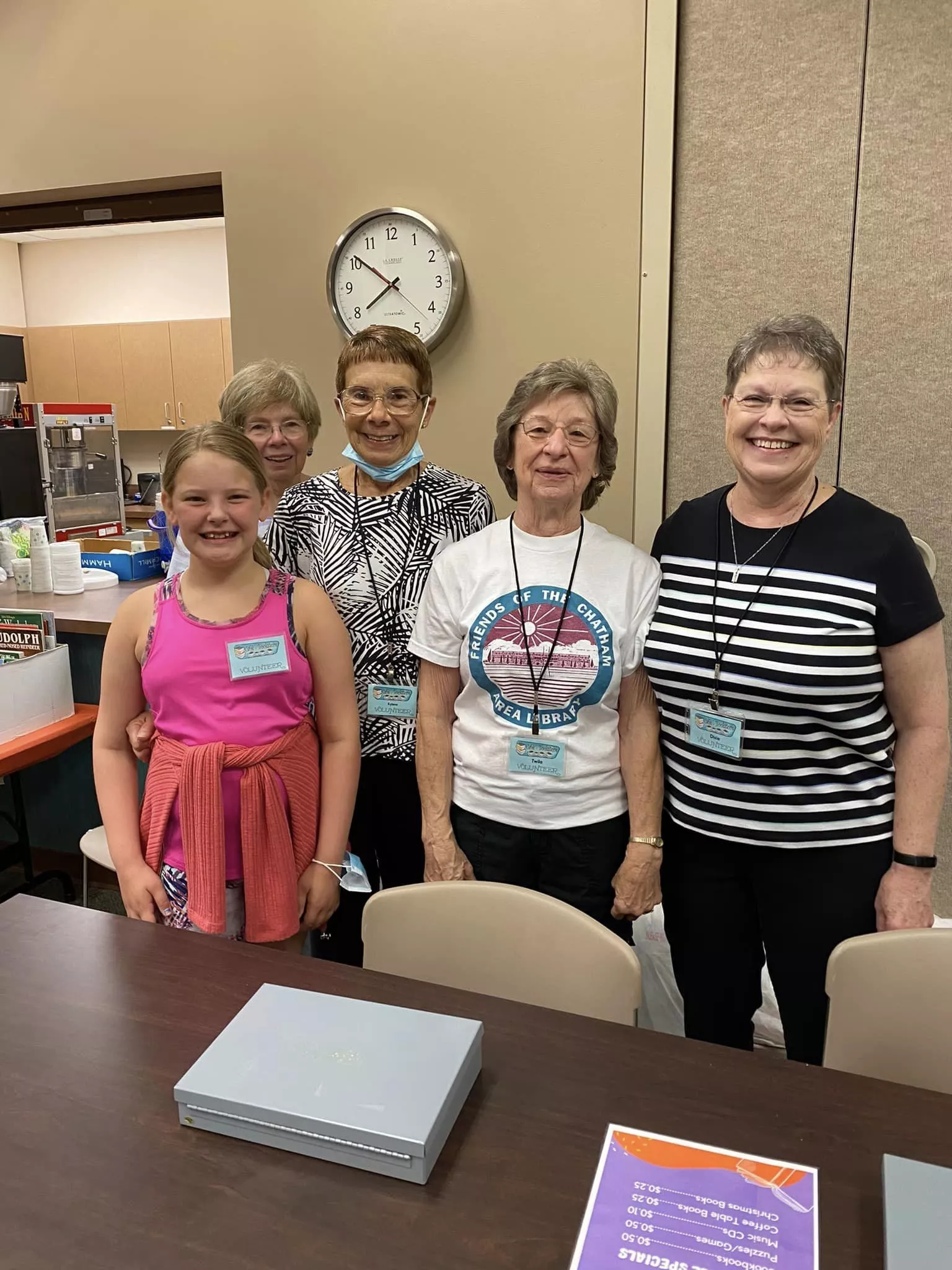 5 volunteers at the Annual Sweet Corn Festival